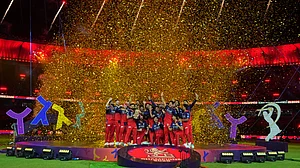 (AP Photo/Ajit Solanki) : Royal Challengers Bengaluru players celebrate with winners trophy after their win in the Indian Premier League final cricket match against Gujarat Titans in Ahmedabad, India, Monday, June 1, 2026