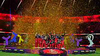(AP Photo/Ajit Solanki) : Royal Challengers Bengaluru players celebrate with winners trophy after their win in the Indian Premier League final cricket match against Gujarat Titans in Ahmedabad, India, Monday, June 1, 2026