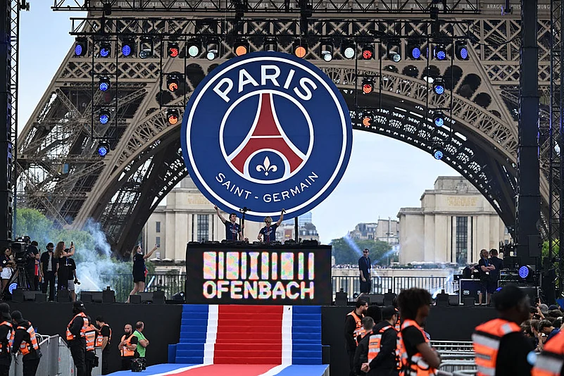 Artists perform ahead of PSGs celebrations the day after winning the Champions League title, at the Eiffel Tower, in Paris.