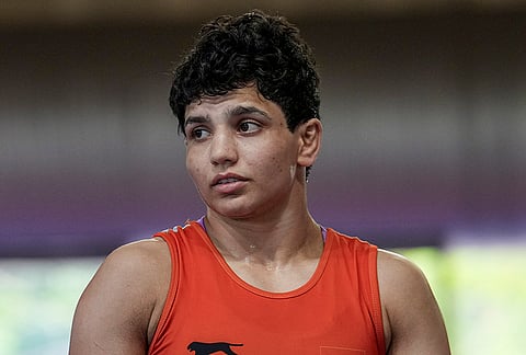 Nishu competes in a 53kg category wrestling match against Vinesh Phogat during the Asian Games selection trials, in New Delhi.