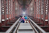 Day In Pics: Jun 01, 2026 | Photo: PTI : Prayagraj: People rest on the railway track of the Lord Curzon Bridge over River Ganga on a hot summer day, in Prayagraj.