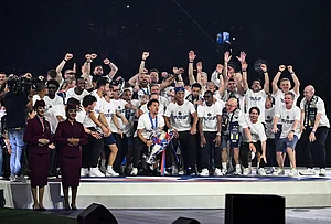 | Photo: AP/Emma Da Silva : PSG members celebrate at Parc des Princes stadium in Paris, after the team won the Champions League final against Arsenal in Budapest.