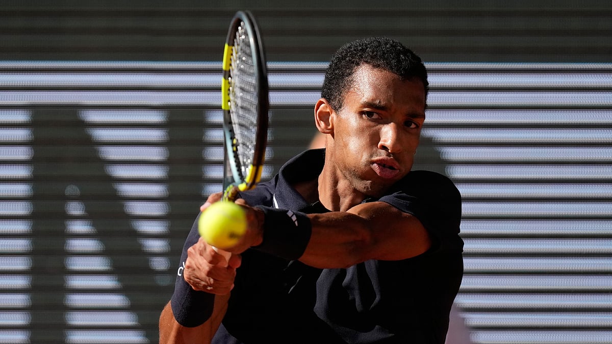 Canada's Felix Auger-Aliassime returns to Chile's Alejandro Tabilo during the fourth-round tennis match at the French Open in Paris. - AP Photo