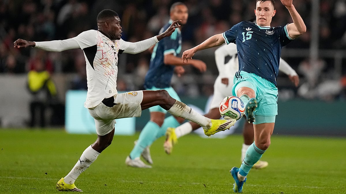 Thomas Partey of Ghana and Nico Schlotterbeck of Germany challenge for the ball during an international friendly soccer match between Germany and Ghana in Stuttgart, Germany, March 30, 2026. - | Photo: AP/Matthias Schrader