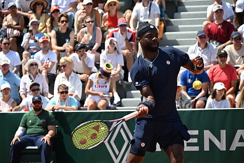 Frances Tiafoe of the U.S. returns to Hubert Hurkacz of Poland during their second round men's singles tennis match at the French Open tennis tournament in Paris, Thursday, May 28, 2026