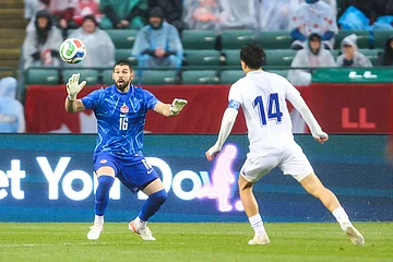 | Photo: Codie McLachlan/The Canadian Press via AP : Canada goalkeeper Maxime Crepeau (16) makes a save against Uzbekistan's Eldor Shomurodov (14) during the first half of an international friendly soccer match in Edmonton, Alberta.