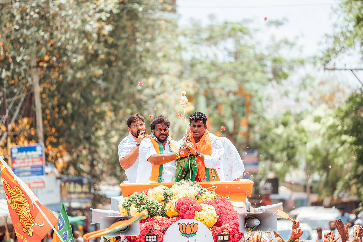 BJP leader K. Annamalai campaigns during a roadshow in support of NDA candidate K.C. Thirumaran for the 2026 Tamil Nadu assembly elections in Tiruppattur constituency, in Tiruppattur on Sunday. - IMAGO / ANI News