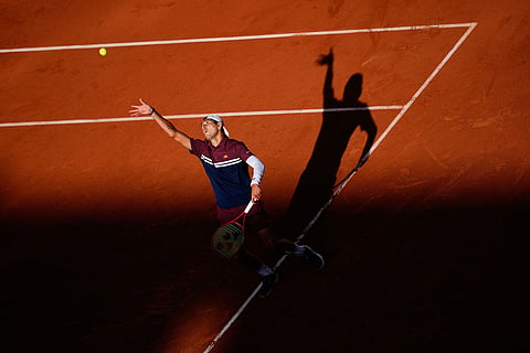 Chile's Alejandro Tabilo serves to Canada's Felix Auger-Aliassime during the fourth-round tennis match at the French Open in Paris.