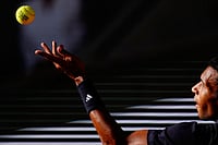 Felix Auger-Aliassime Vs Alejando Tabilo, French Open 2026: Canadian Enters Quarter-Final With Straight-Sets Victory | Photo: AP/Christophe Ena : Canada's Felix Auger-Aliassime serves to Chile's Alejandro Tabilo during the fourth-round tennis match at the French Open in Paris.