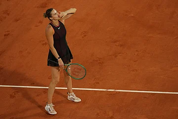 | Photo: AP/Aurelien Morissard : Aryna Sabalenka of Belarus reacts after winning the fourth-round tennis match against Japan's Naomi Osaka at the French Open in Paris.