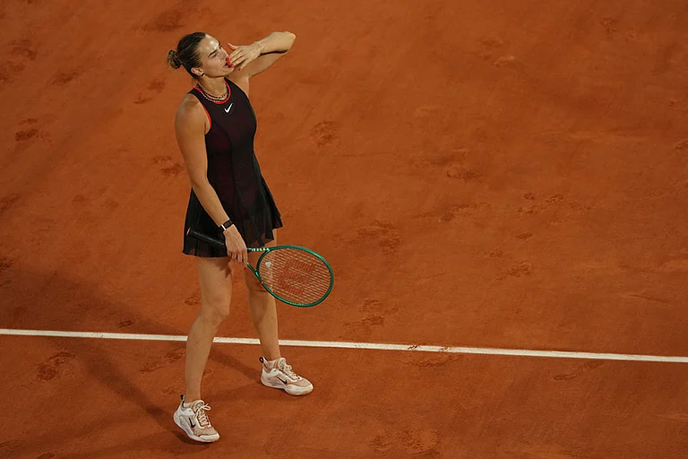 Aryna Sabalenka of Belarus reacts after winning the fourth-round tennis match against Japan's Naomi Osaka at the French Open in Paris. - | Photo: AP/Aurelien Morissard