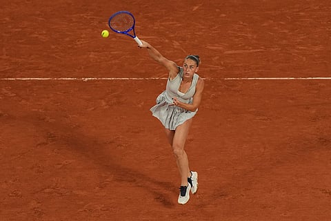 Ukraine's Marta Kostyuk returns to Ukraine's Elina Svitolina during the quarterfinal tennis match at the French Open in Paris.