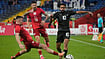 | Photo: AP/Czarek Sokolowski : New Zealand’s Sarpreet Singh, right, challenges for the ball with Poland’s Kacper Kozlowski, left, and Paweł Wszolek during a friendly soccer match between Poland and New Zealand at the Silesian Stadium in Chorzow, Poland, Thursday, Oct. 9, 2025.