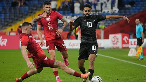 | Photo: AP/Czarek Sokolowski : New Zealand’s Sarpreet Singh, right, challenges for the ball with Poland’s Kacper Kozlowski, left, and Paweł Wszolek during a friendly soccer match between Poland and New Zealand at the Silesian Stadium in Chorzow, Poland, Thursday, Oct. 9, 2025.