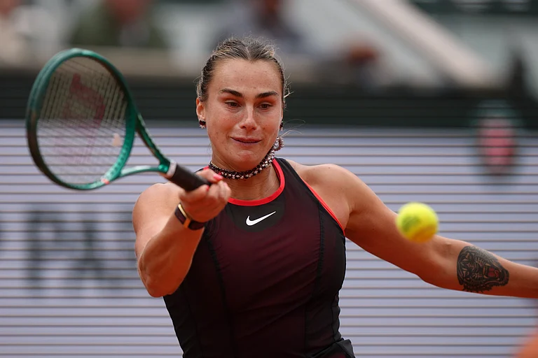Aryna Sabalenka of Belarus retruns to Russia's Diana Shnaider during the quarterfinal tennis match at the French Open in Paris, Wednesday. - AP/Aurelien Morissard