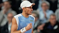 AP Photo : Italy's Matteo Arnaldi reacts during the quarterfinal tennis match against Italy's Matteo Berrettini at the French Open in Paris.