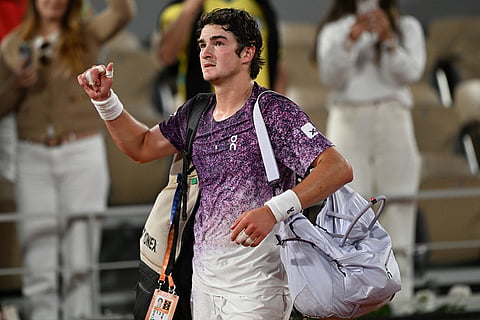 Brazil's Joao Fonseca walks off the court the quarterfinal tennis match against Czech Republic's Jakub Mensik at the French Open in Paris.