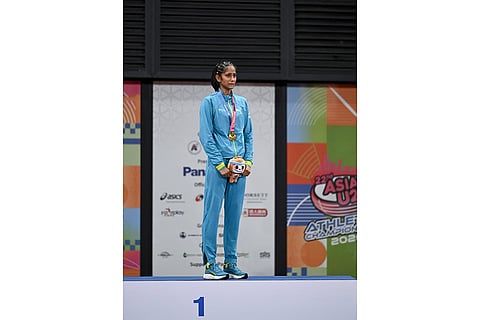 Pooja Singh on the podium after winning gold in the women’s high jump with a 1.93m clearance at the Asian U20 Athletics Championships 2026.