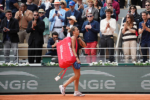 Aryna Sabalenka of Belarus walks off the court after the quarterfinal tennis match against Russia's Diana Shnaider at the French Open in Paris.