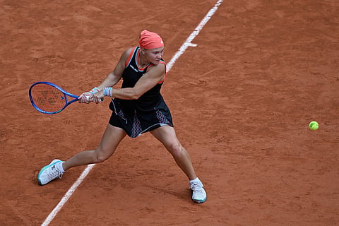 Russia's Diana Shnaider returns to Aryna Sabalenka of Belarus during the quarterfinal tennis match at the French Open in Paris.