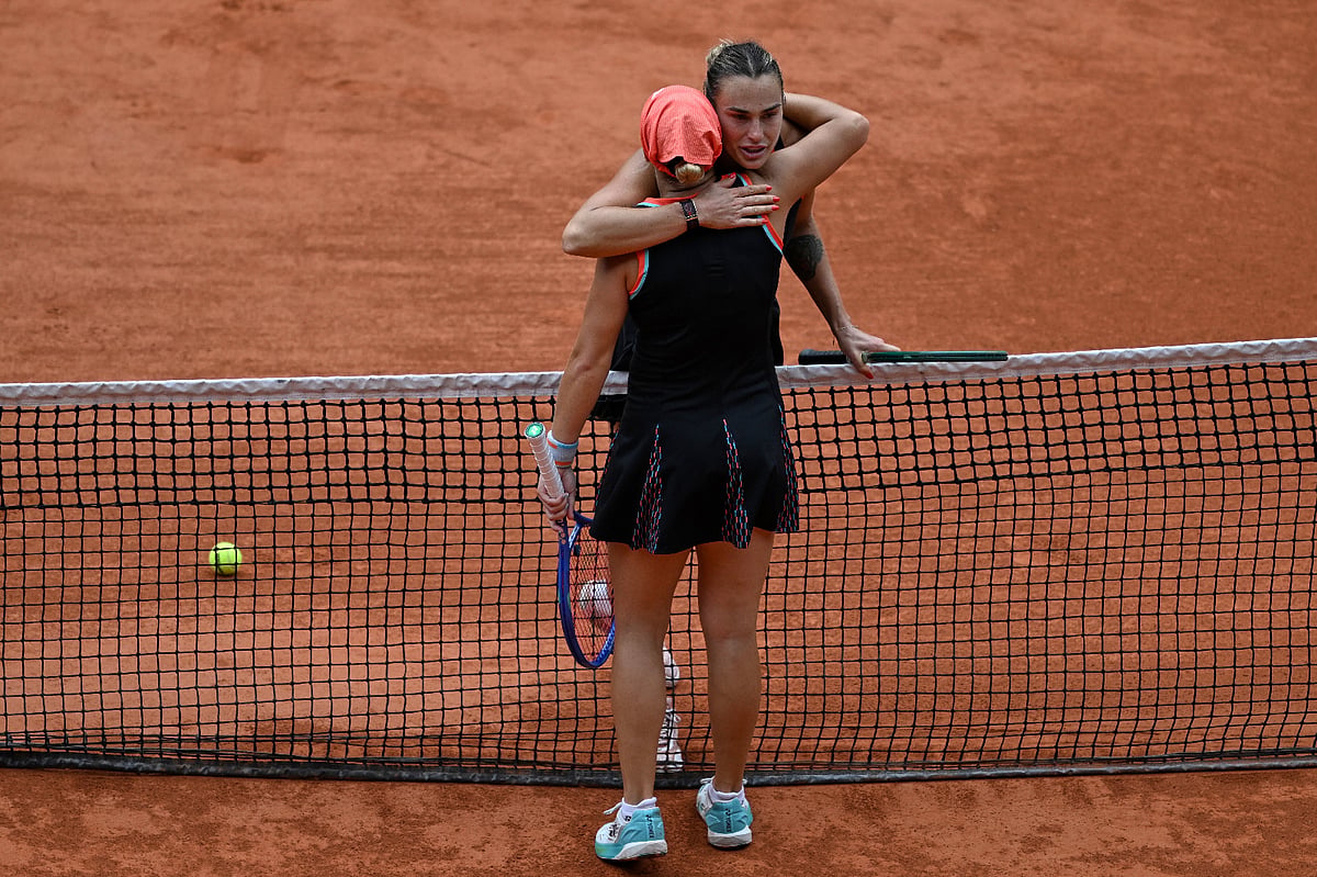 Aryna Sabalenka of Belarus hugs Russia's Diana Shnaider after the quarterfinal tennis match at the French Open in Paris, Wednesday, June 3, 2026.  - AP