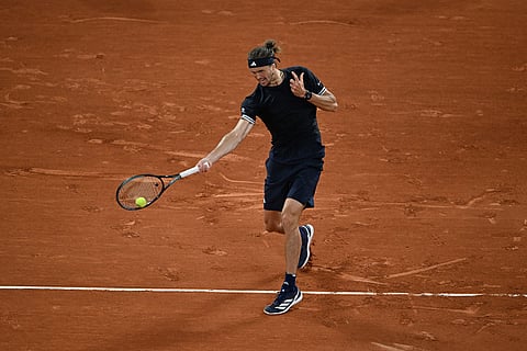 Germany's Alexander Zverev returns to Spain's Rafael Jodarduring the quarterfinal tennis match at the French Open in Paris.