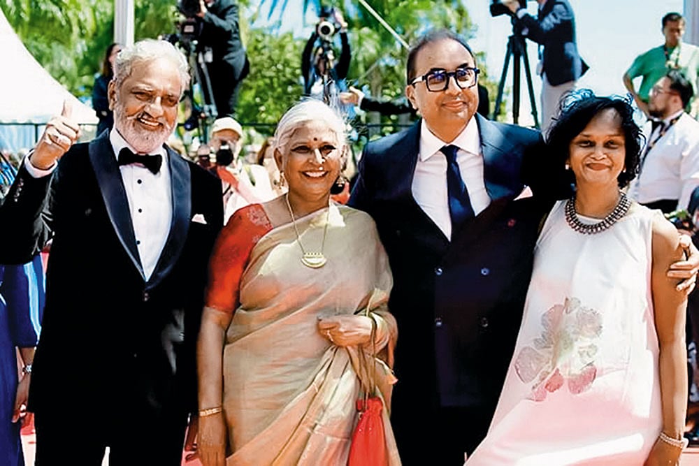 Showcasing A Classic (Left to Right) Actor Joy Mathew, editor Bina Paul and Film Heritage Foundation director Shivendra Singh Dungarpur at the Cannes Film Festival - | Courtesy: IMDB
