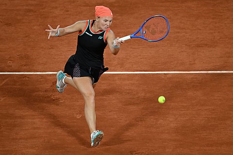Russia's Diana Shnaider returns to Poland's Maja Chwalinska during the semifinal tennis match at the French Open in Paris.