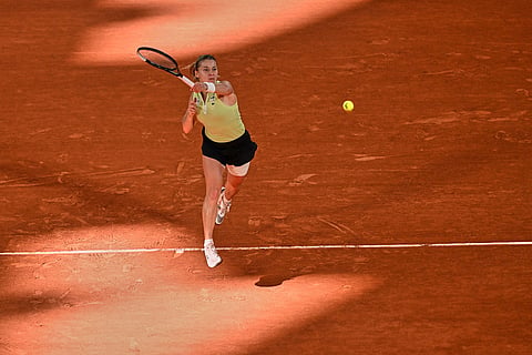 Poland's Maja Chwalinska retruns to Russia's Diana Shnaider during the semifinal tennis match at the French Open in Paris.