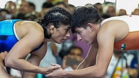 Vinesh Phogat Vs WFI: Supreme Court Dismisses Plea On Selection Trials, Calls It Infructuous | Photo: PTI/Kamal Kishore : Vinesh Phogat, in blue, competes against Jyoti in a 53kg category wrestling match during the Asian Games selection trials, in New Delhi.