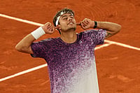 | Photo: AP/Aurelien Morissard : Italy's Flavio Cobolli reacts after winning the quarterfinal tennis match against Canada's Felix Auger-Aliassime at the French Open in Paris.