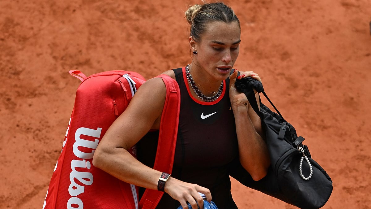 Aryna Sabalenka of Belarus walks off the court after the quarterfinal tennis match against Russia's Diana Shnaider at the French Open in Paris. - AP Photo