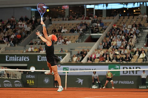 Russia's Diana Shnaider returns to Poland's Maja Chwalinska during the semifinal tennis match at the French Open in Paris.