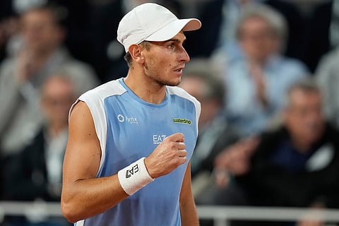 Italy's Matteo Arnaldi reacts during the quarterfinal tennis match against Italy's Matteo Berrettini at the French Open in Paris.