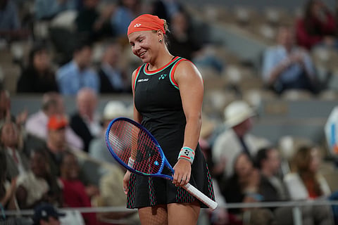 Russia's Diana Shnaider reacts during the semifinal tennis match against Poland's Maja Chwalinska at the French Open in Paris.