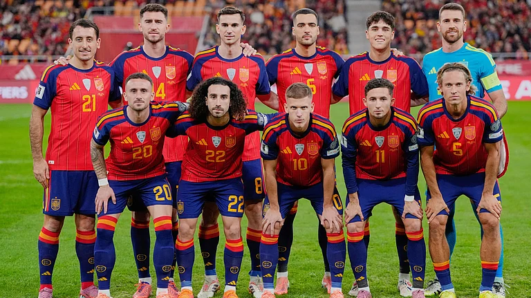 Spain players pose for a team photo before the 2026 World Cup qualifier group E soccer match against Turkey in Seville, Spain. - AP Photo