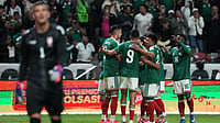 (AP Photo/Fernando Llano) : Mexico's Johan Vasquez is congratulated after scoring his side's first goal against Serbia during an international friendly soccer match in Toluca, Mexico, Thursday, June 4, 2026