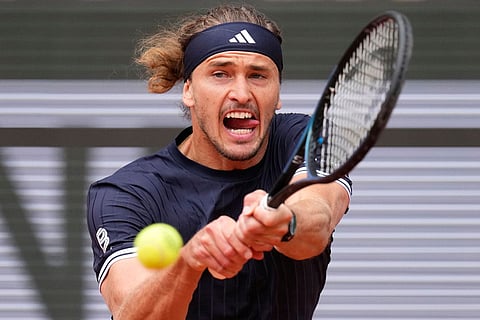 Germany's Alexander Zverev returns to Czech Republic's Jakub Mensik during the semifinal tennis match at the French Open in Paris.