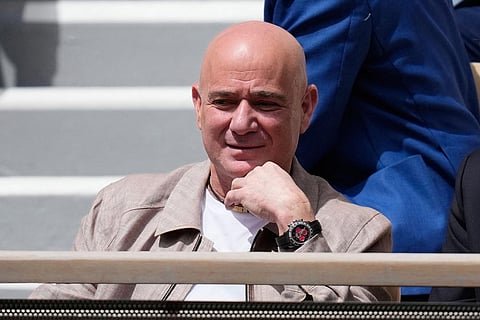 Former tennis start Andre Agassi watches the semifinal tennis match between Czech Republic's Jakub Mensik and Germany's Alexander Zverev at the French Open in Paris.