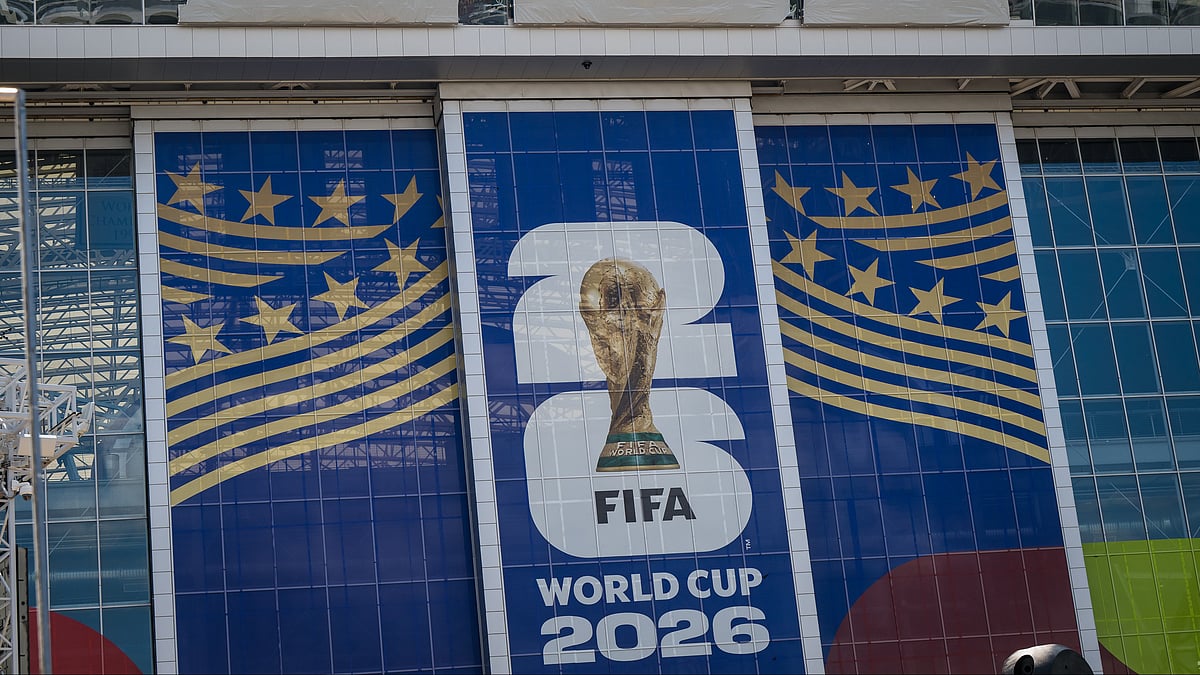 Signage on the exterior of AT&T Stadium, which will be named Dallas Stadium during the 2026 FIFA World Cup, is covered by workers as preparations continue at the venue ahead of the football tournament. - AP Photo