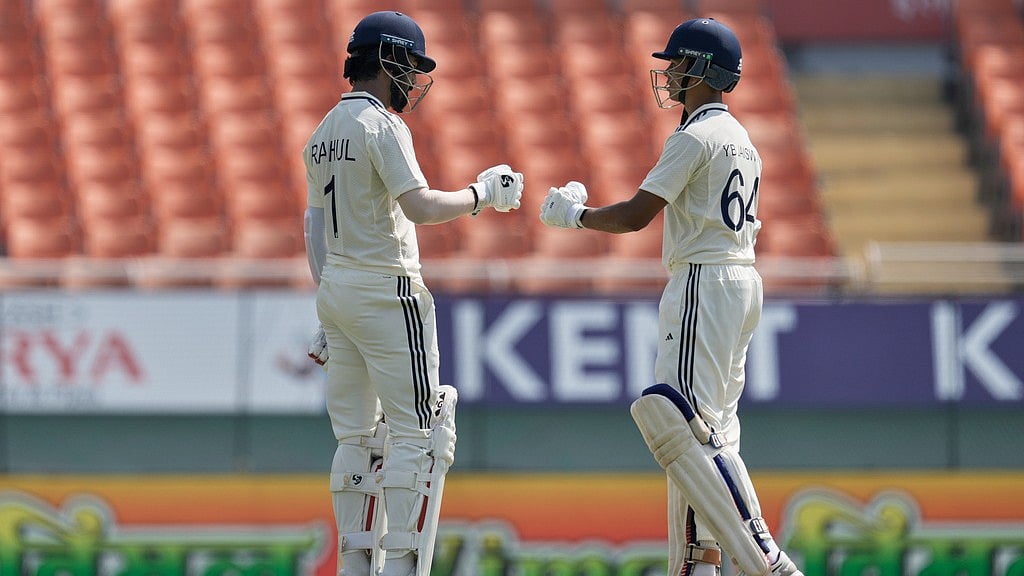 India's KL Rahul, left, and batting partner Yashasvi Jaiswal touch gloves during the test match between Afghanistan and India in New Chandigarh, India on Saturday, June 6, 2026.  - AP Photo/Ashwini Bhatia