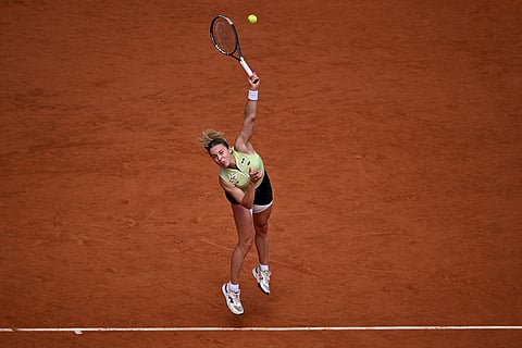 Poland's Maja Chwalinska returns during the final tennis match against Russia's Mirra Andreeva at the French Open in Paris.