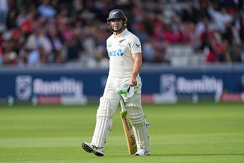 New Zealand's Tom Latham leaves the pitch after losing his wicket during the second day of the test match between England and New Zealand at Lord's cricket ground in London.