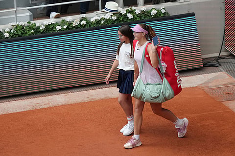 Russia's Mirra Andreeva enters the court for the final tennis match against Poland's Maja Chwalinska at the French Open in Paris.