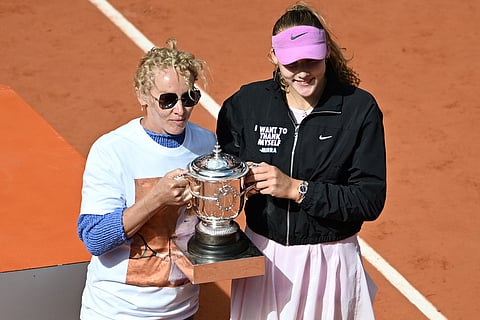 Russia's c poses with her mother Raisa after winning the final tennis match against Poland's Maja Chwalinska at the French Open in Paris