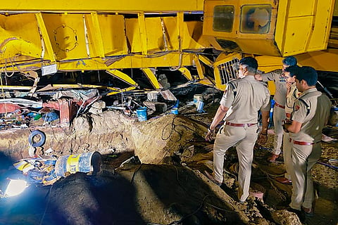 Police personnel at the site after a crane collapsed during Jewar flyover construction, in Faridabad, Haryana.