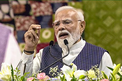 In this screengrab from a video posted on June 5, 2026, Prime Minister Narendra Modi addresses the inauguration and laying of foundation stones of various development projects, in Surat district, Gujarat.
