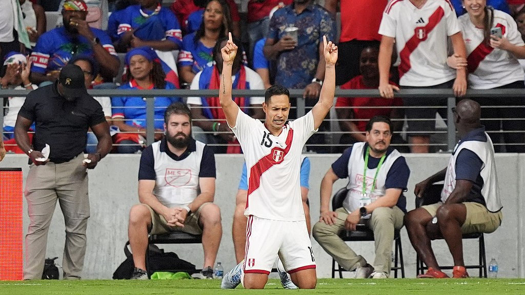 Peru defender Renzo Garces celebrates scoring his side's first goal during the second half of an international friendly soccer match against Haiti on Friday, June 5, 2026, in Miami. - AP Photo/Rebecca Blackwell