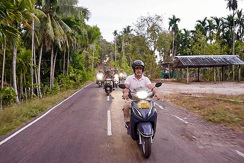 In this image posted on June 5, 2026, Congress leader Rahul Gandhi rides a scooty during a visit to the Andaman and Nicobar Islands.