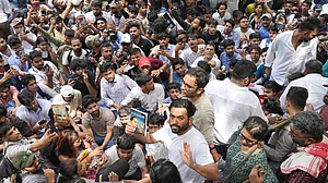 Suresh K Pandey : Abhijeet Dipke at the protest holding the autobiography of BR Ambedkar.